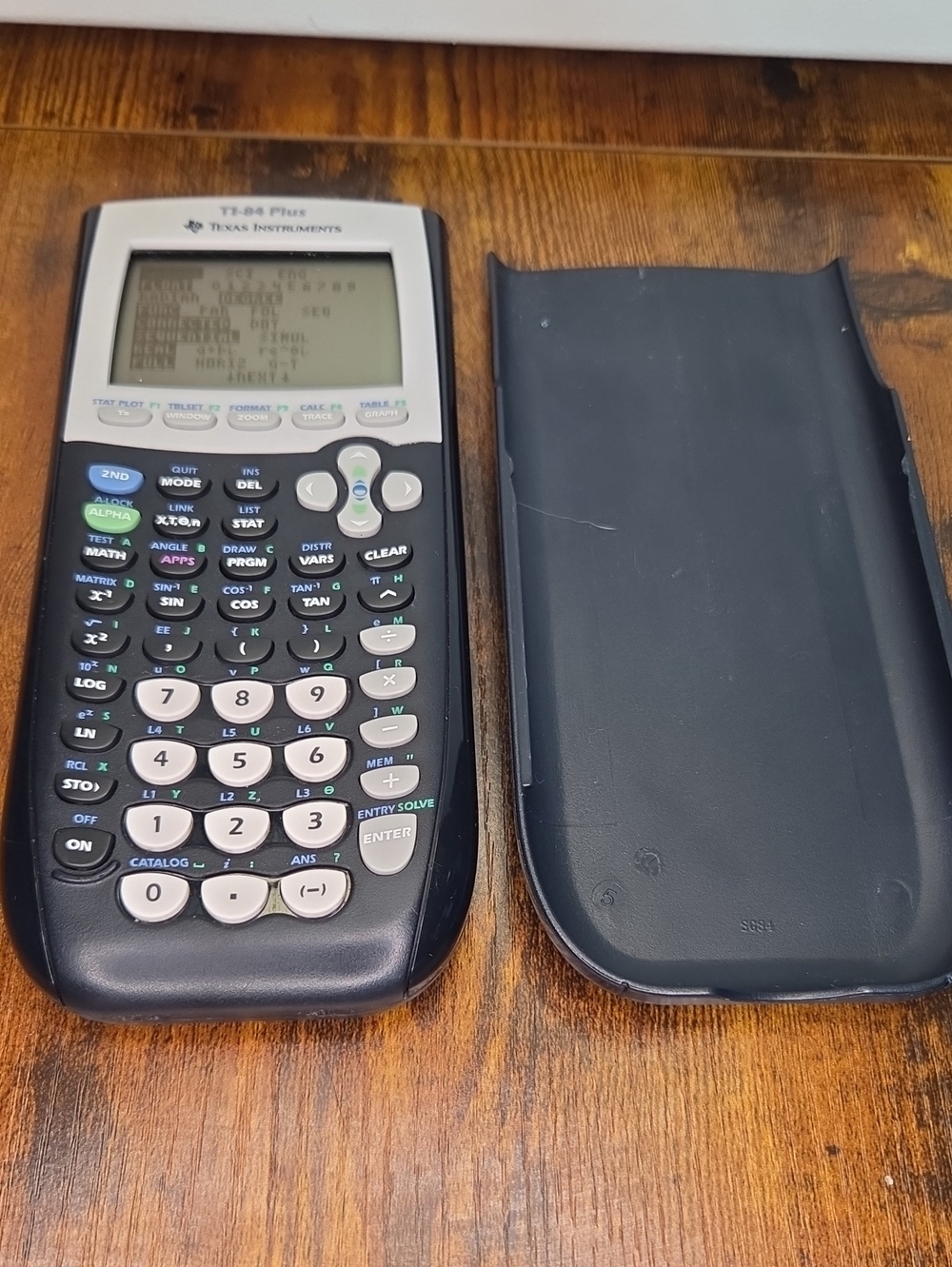 Texas Instruments TI-84 Plus Graphing Calculator in Black and White